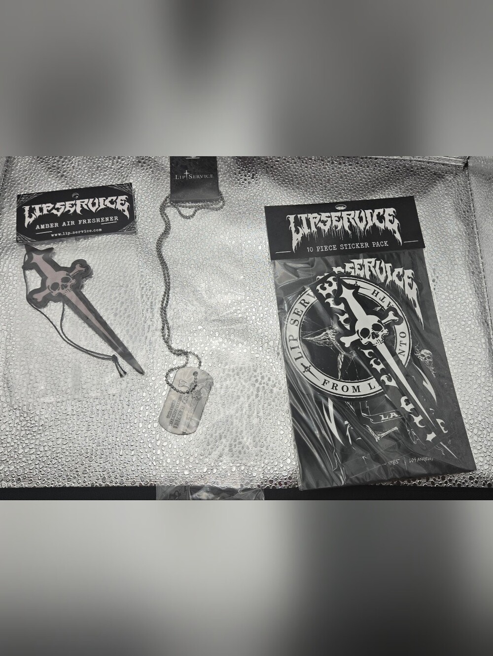 Lip Service Bundle Sword Skull Dogtag Necklace & Air Freshener & 10 Pk Stickers